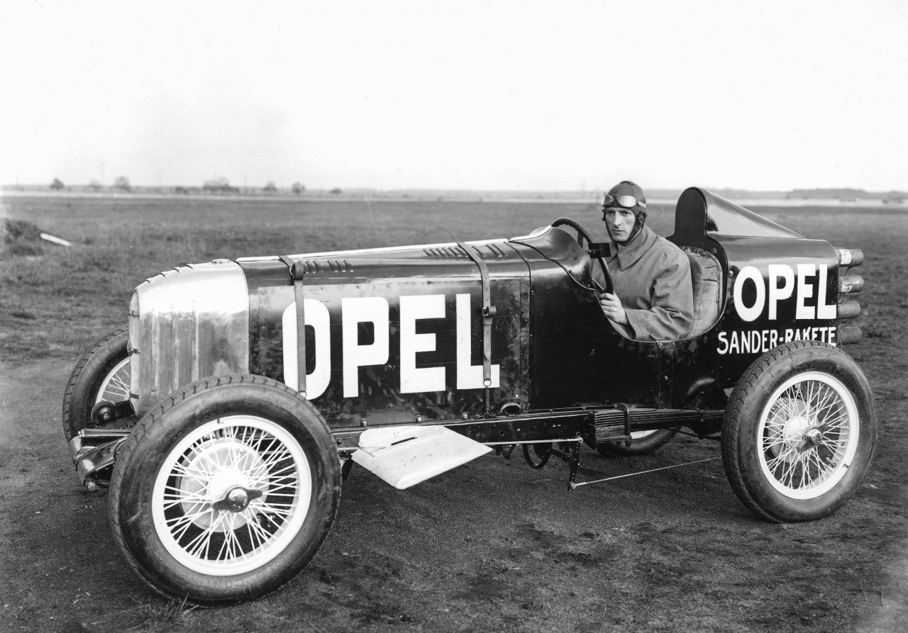 First ever rocket car: Opel RAK 1 with Opel engineer and racing driver Kurt Volkhart at the wheel.